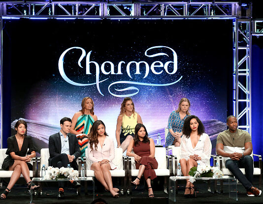 BEVERLY HILLS, CA - AUGUST 06: (Top L-R) Jessica O'Toole, Jennie Snyder Urman, Amy Rardin (Bottom L-R) Ellen Tamaki, Rupert Evans, Sarah Jeffery, Melonie Diaz, Madeleine Mantock, and Ser'Darius Blain from "Charmed" speaks onstage at the CW Network portion of the Summer 2018 TCA Press Tour at The Beverly Hilton Hotel on August 6, 2018 in Beverly Hills, California. (Photo by Frederick M. Brown/Getty Images)