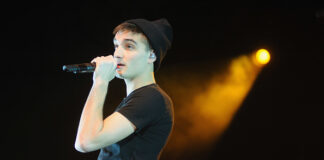 Tom Parker from The Wanted during a performance