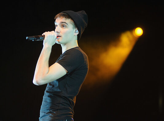 Tom Parker from The Wanted during a performance