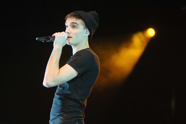 Tom Parker from The Wanted during a performance