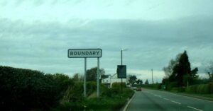 A sign saying "Boundary"